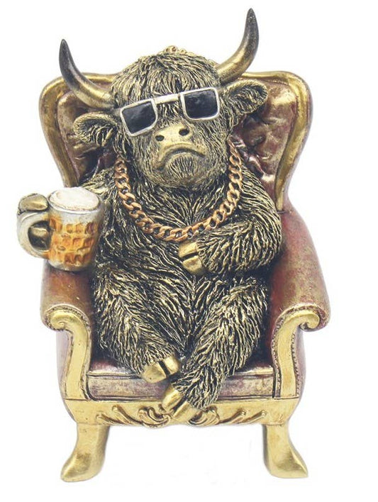 Relaxing Highland Cow Figurine