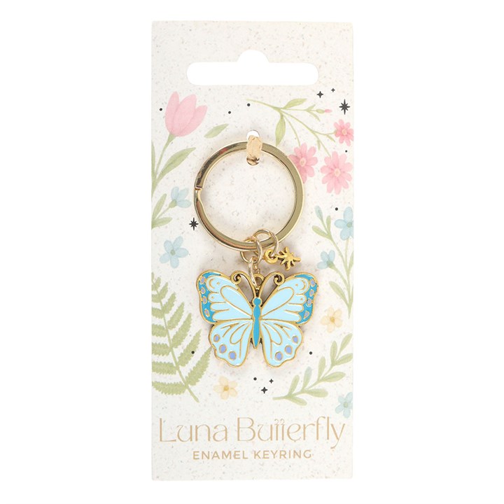Luna Butterfly enamel keyring on floral packaging