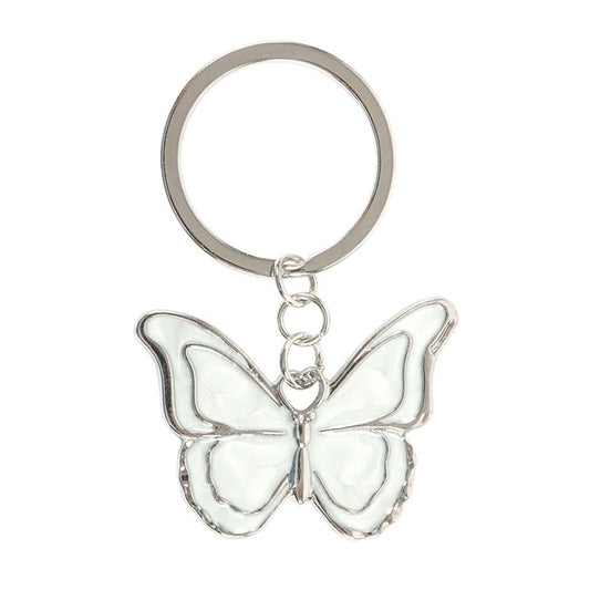White butterfly enamel keyring charm close up on white background showing silver tone wing detailing