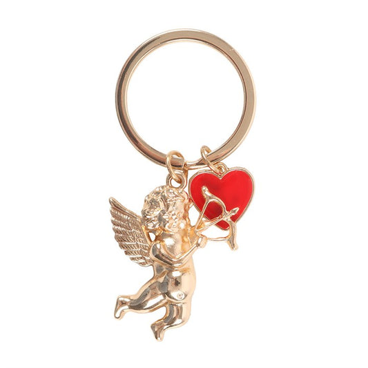Cupid's Delivery metal keyring charm close up on white background showing gold cherub with wings and bow and red enamel heart charm
