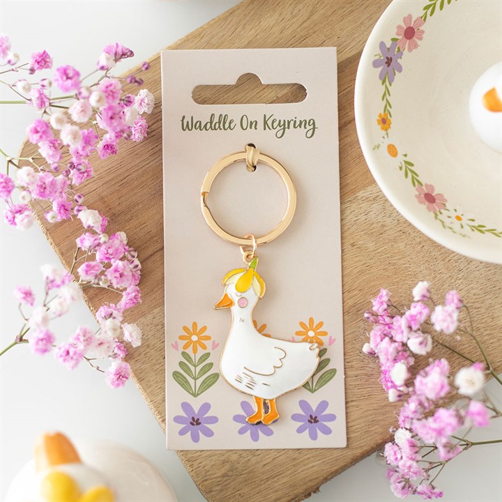 Waddle On Duck Keyring on packaging with pink flowers