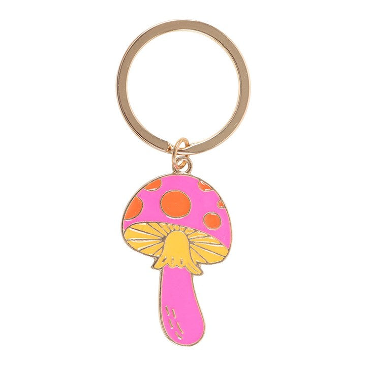 Funky Fungi pink enamel mushroom keyring charm close up on white background