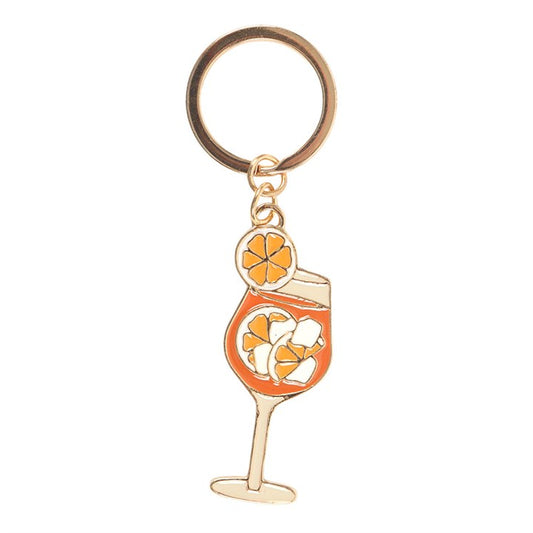Spritz Season enamel keyring charm close up on white background showing orange Aperol Spritz glass with ice and dangling orange slice charm