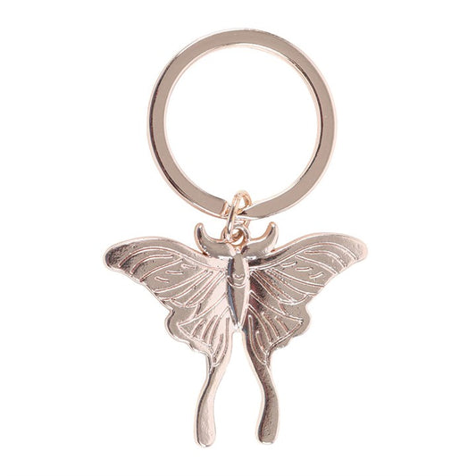 Luna moth metal keyring charm close up on white background showing silver tone wings with engraved markings and trailing tails