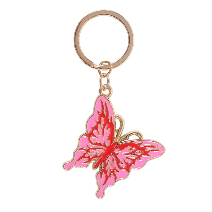 Flaming butterfly enamel keyring charm close up on white background showing hot pink and red wings with gold cybersigil detailing