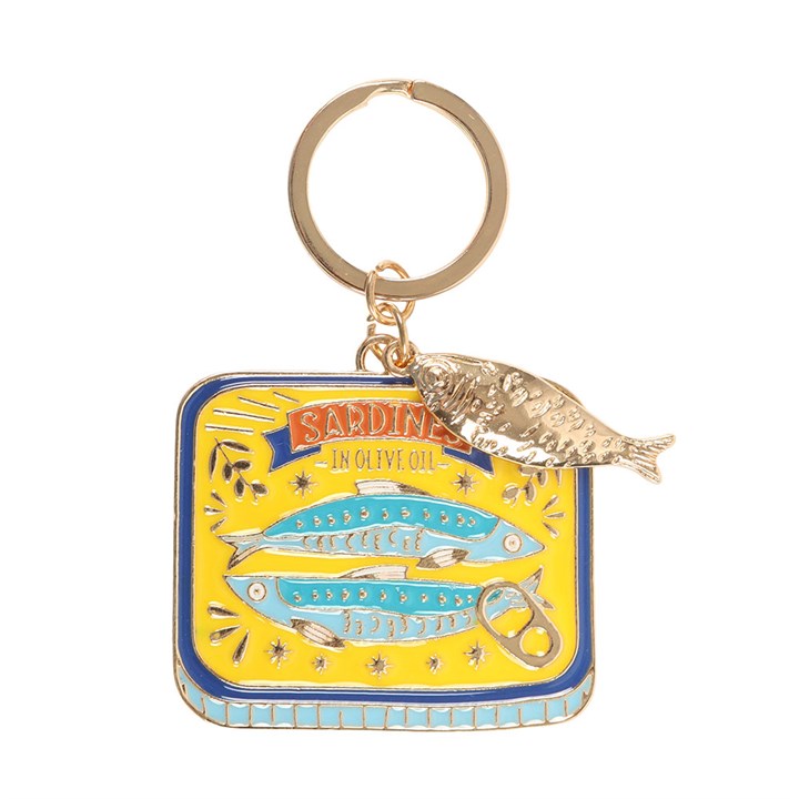 Sardine tin enamel keyring charm close up on white background showing yellow and blue tin with dangling gold sardine charm